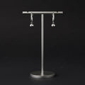 Aretes Argolla con Dije Bola en Plata 925 — Minimalismo con Movimiento