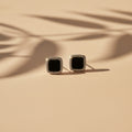 Aretes Topo Cuadrado Ónix Negro con Halo de Zirconias en Plata 925 — Elegancia Oscura